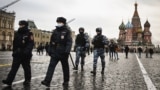 RUSSIA -- Police officers and the Russian National Guard (Rosgvardia) servicemen patrol on Red Square in central Moscow, January 25, 2021