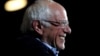 U.S. -- U.S. Democratic presidential candidate Senator Bernie Sanders smiles as he speaks to supporters about being declared the winner of the Nevada Democratic Caucus during a campaign rally in San Antonio, Texas, February 22, 2020