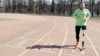 Russia -- TV anchor Dmitry Ignatov runs the distance on the stadium